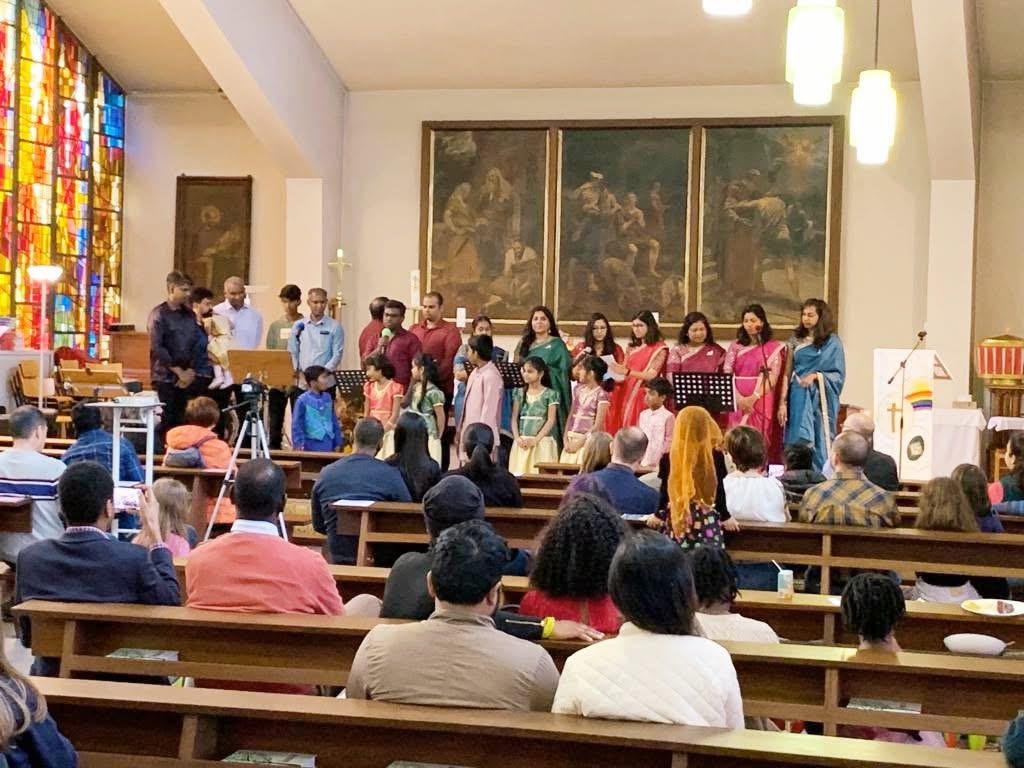 Church members praying together